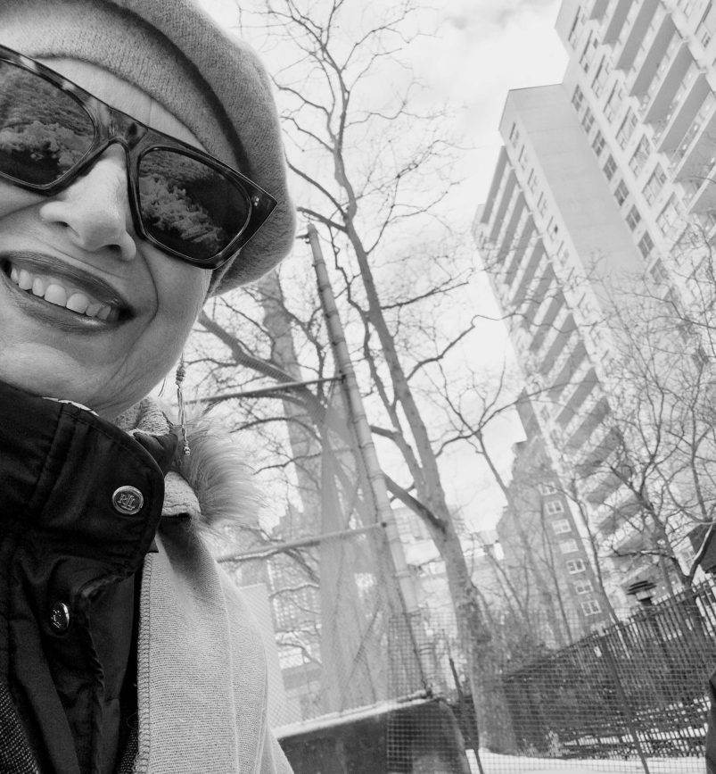 laura smiling in the park